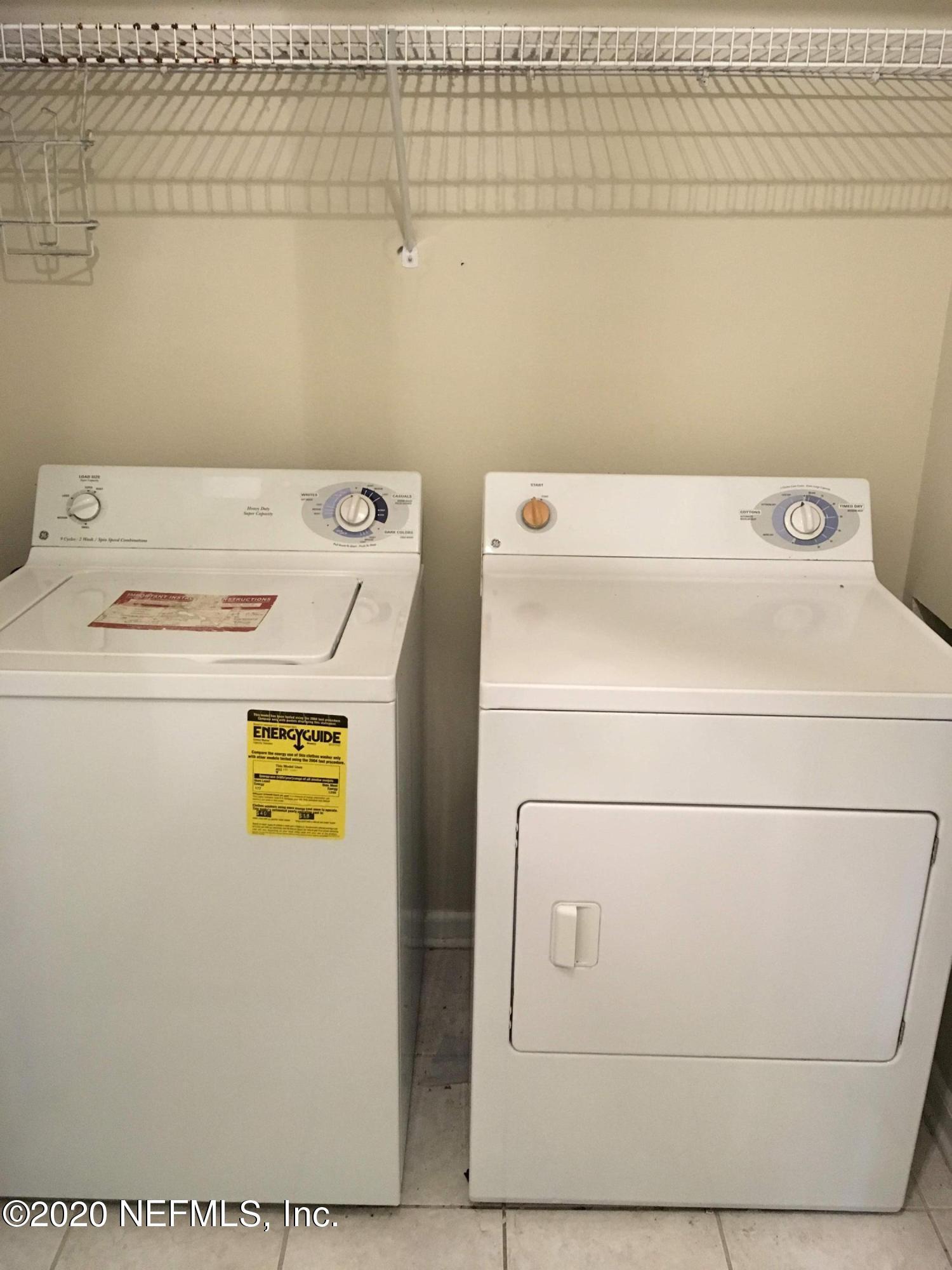 10550 Baymeadows Road, Unit 806 Jacksonville, FL 32256 - Photo 26 of 30 a utility room with dryer and washer
