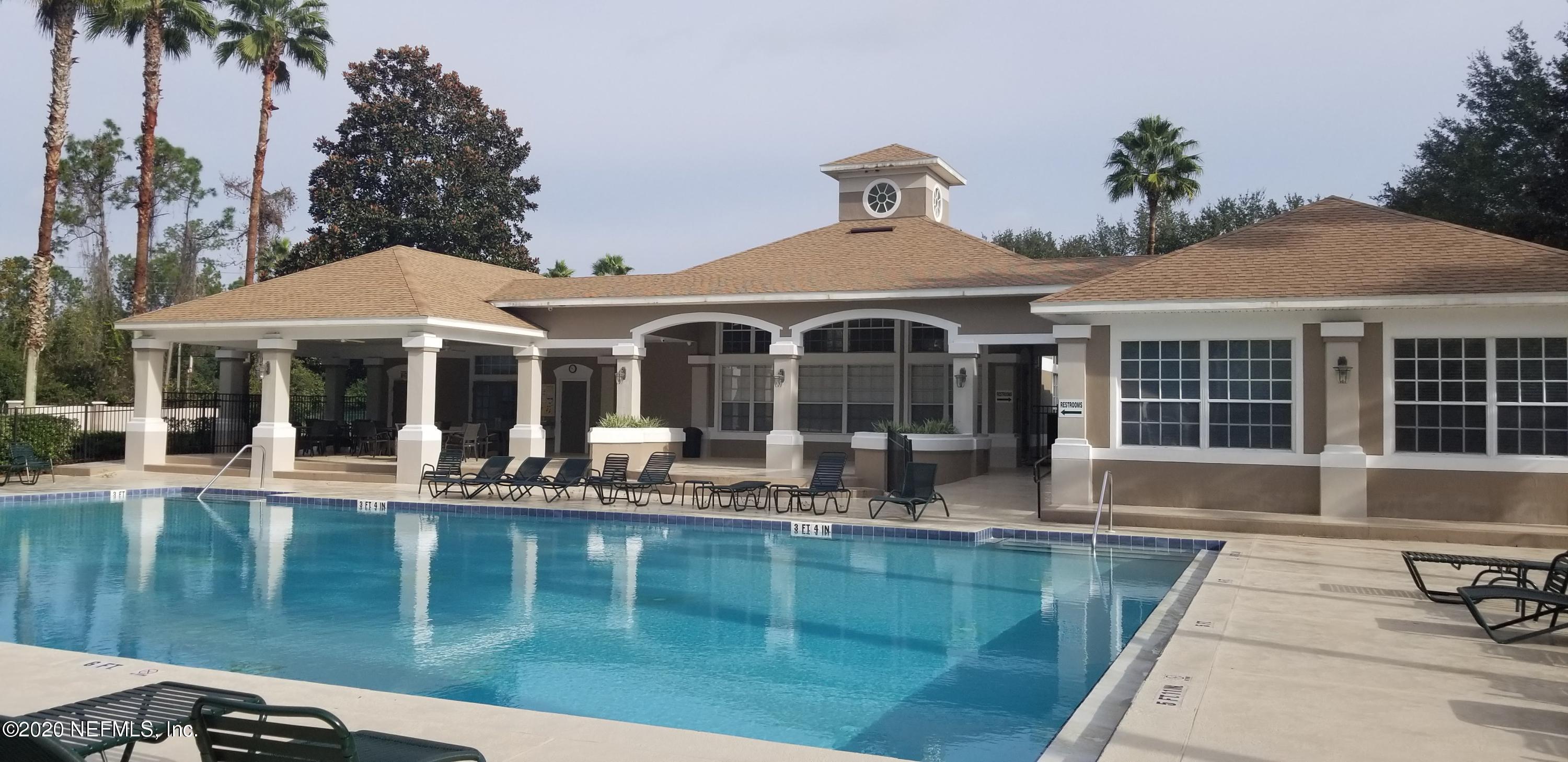 10550 Baymeadows Road, Unit 806 Jacksonville, FL 32256 - Photo 28 of 30 a front view of a house with swimming pool