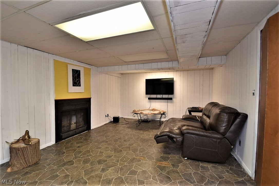3347 Braemar Road Cleveland, OH 44120 - Photo 22 of 28 Family room on the lower level has a fireplace.