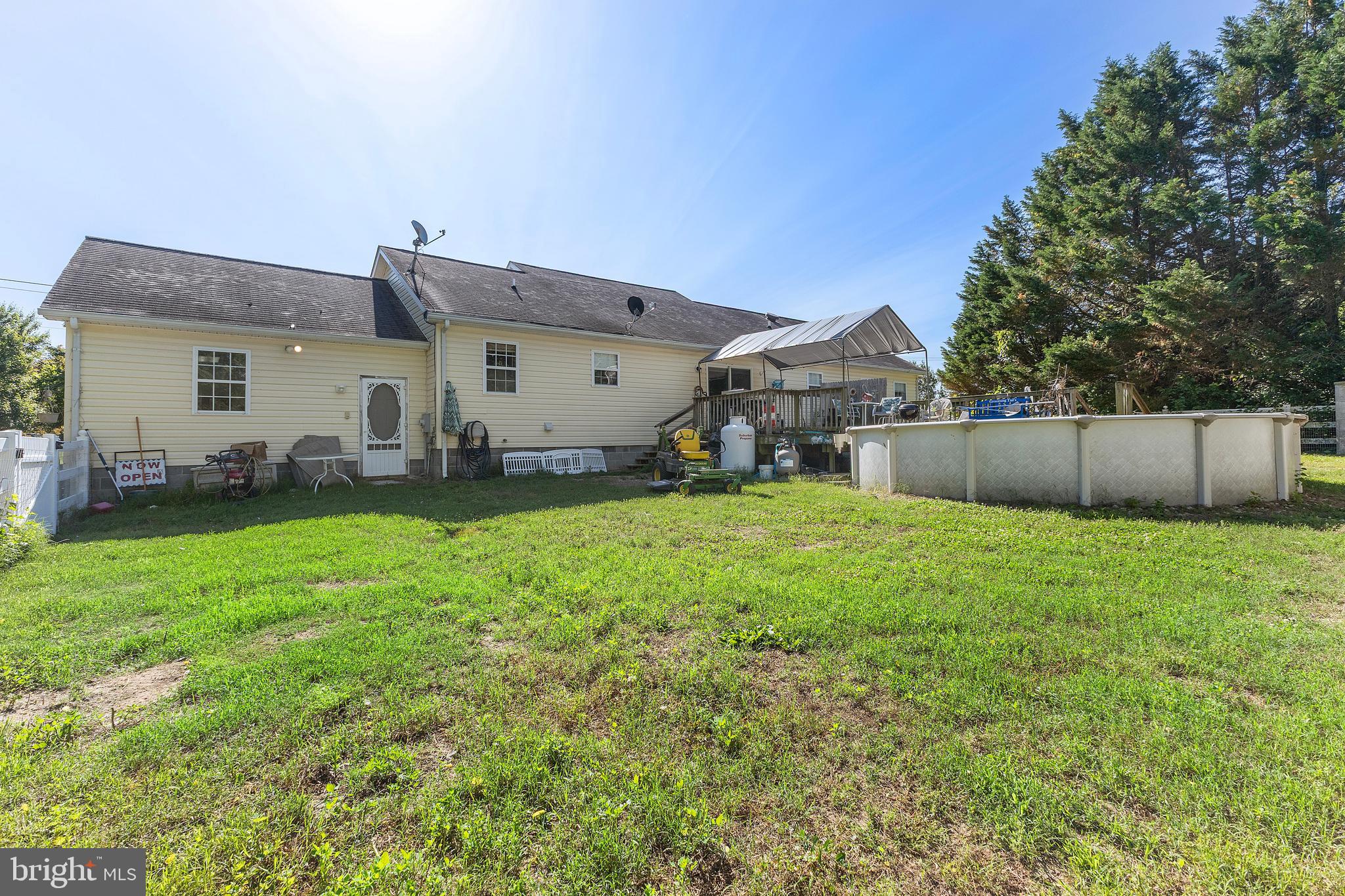 7112 East New Market Ellwood Road Hurlock, MD 21643 - Photo 23 of 41 a view of a house with a yard and sitting area
