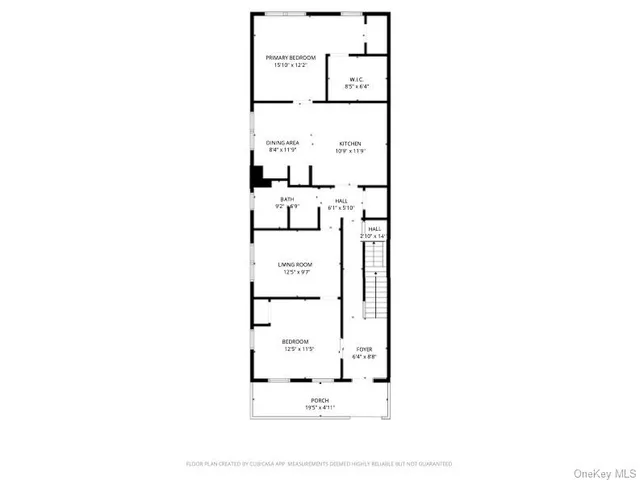 a picture of a bench in front of gate