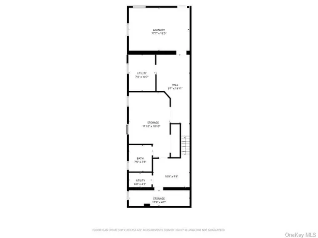 a picture of a bench in front of a wall