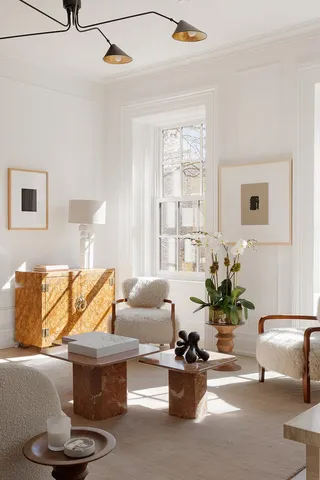 a spacious bedroom with a bed and a couch