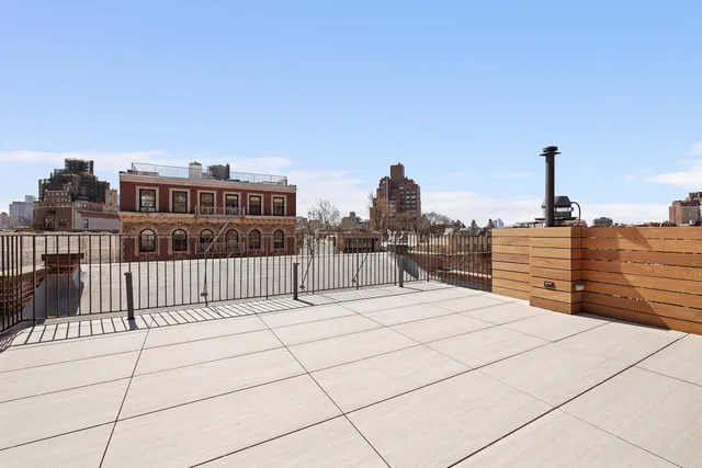 a city view with tall buildings and street