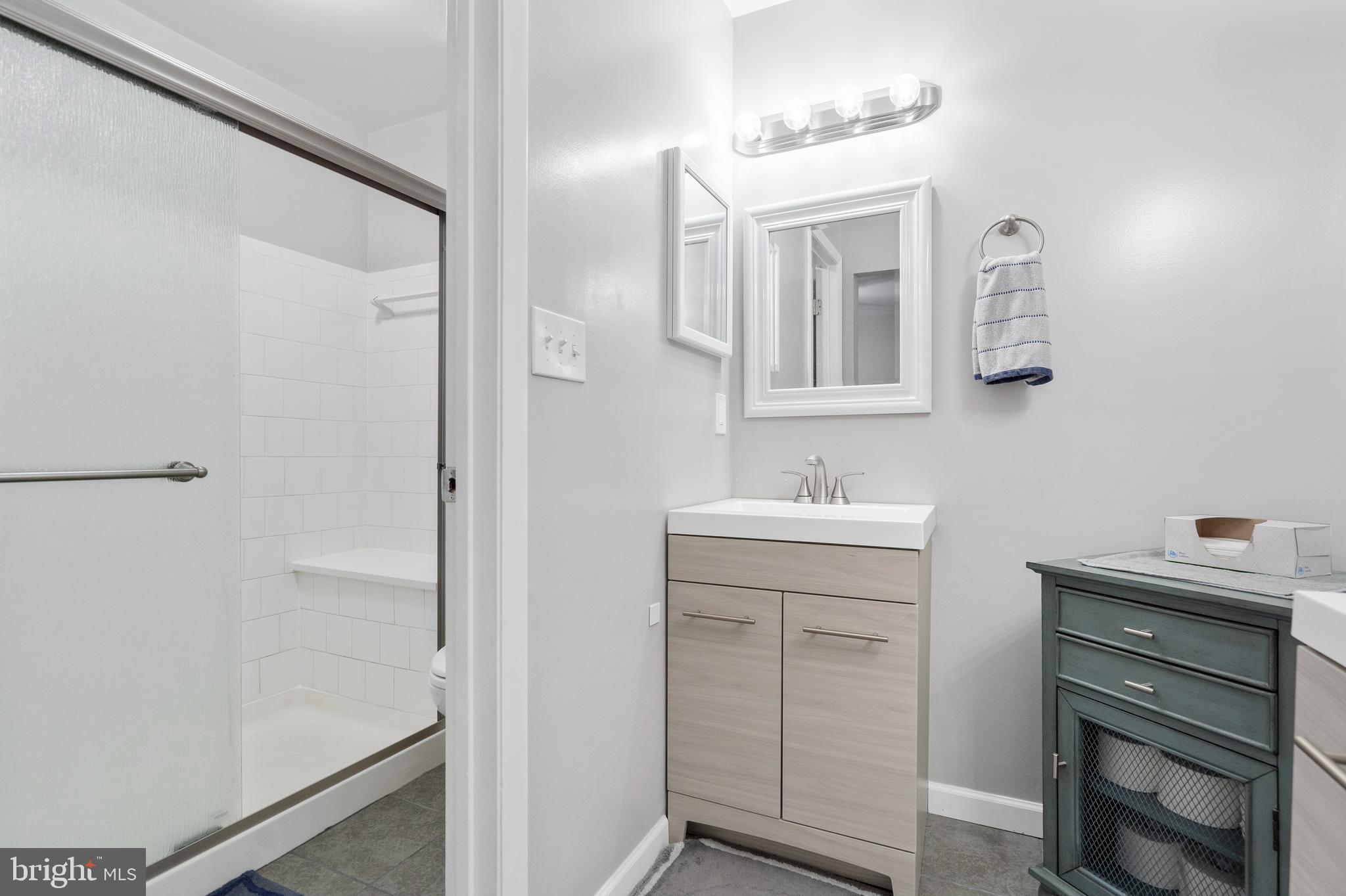 8019 Valley Manor Road, Unit 2B Owings Mills, MD 21117 - Photo 19 of 29 En Suite Bathroom With Elegant Finishes
