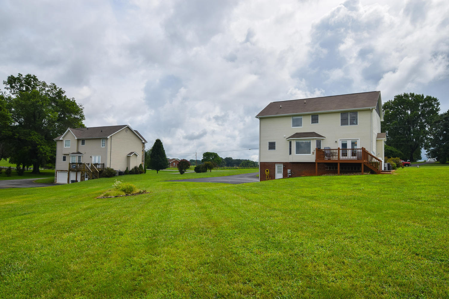 1365 Mill Iron Road Goodview, VA 24095 - Photo 22 of 29 a front view of house with yard and green space