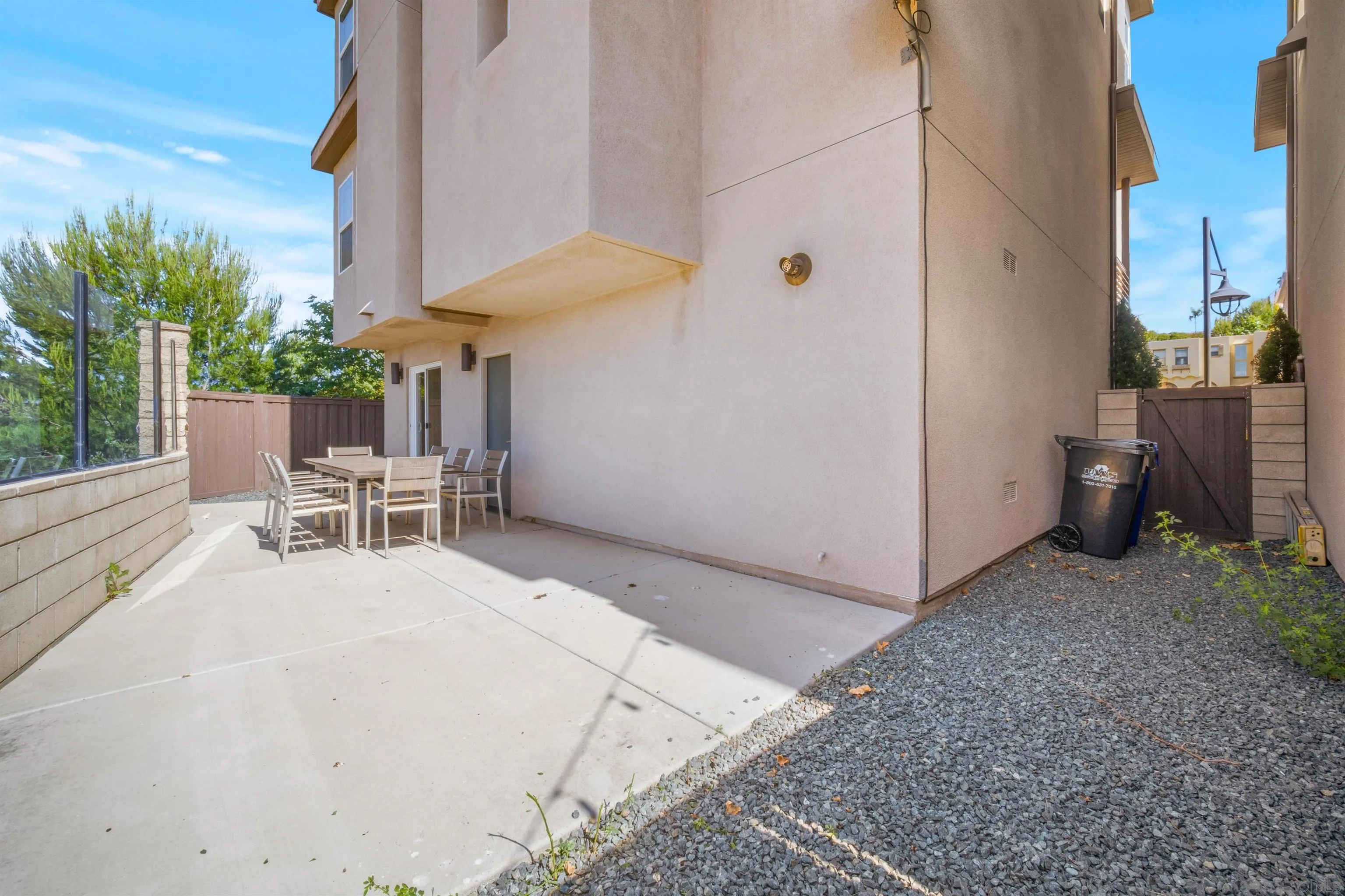 8329 Ridge Court San Diego, CA 92108 - Photo 11 of 39 a view of backyard with wheel chair potted plants and outdoor seating