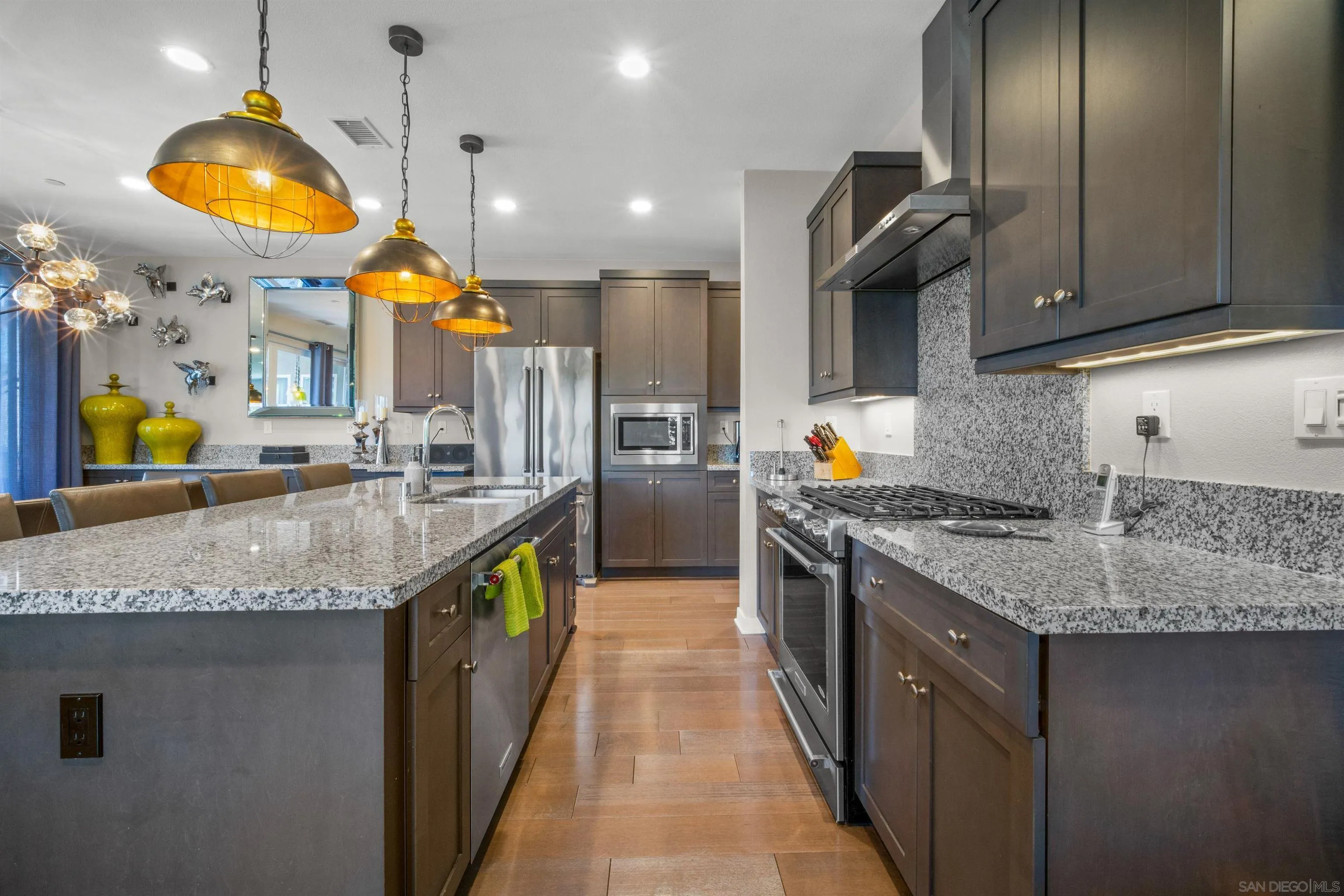 8329 Ridge Court San Diego, CA 92108 - Photo 16 of 39 a kitchen with stainless steel appliances granite countertop a sink and a stove