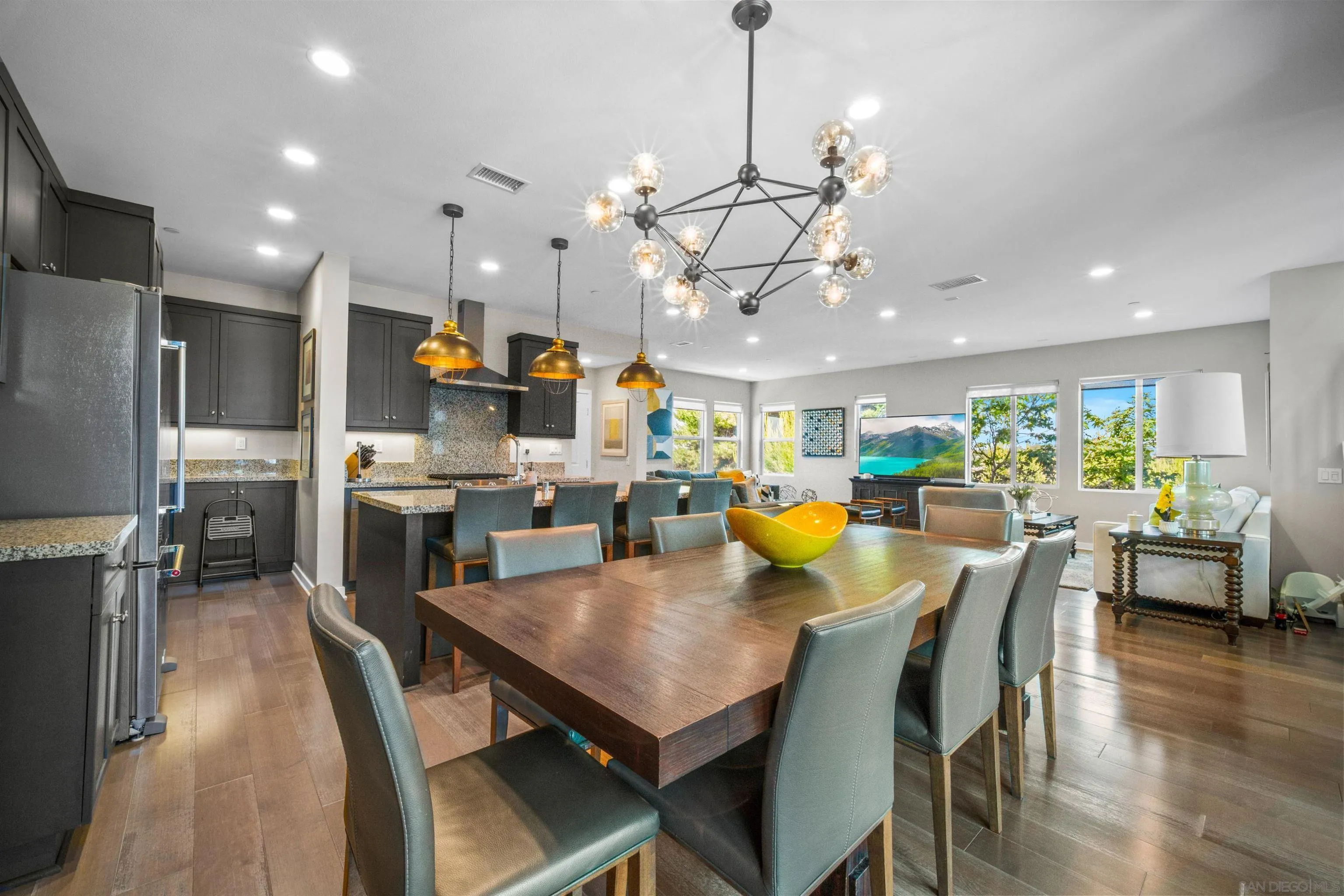 8329 Ridge Court San Diego, CA 92108 - Photo 20 of 39 a view of a dining area with furniture window and wooden floor