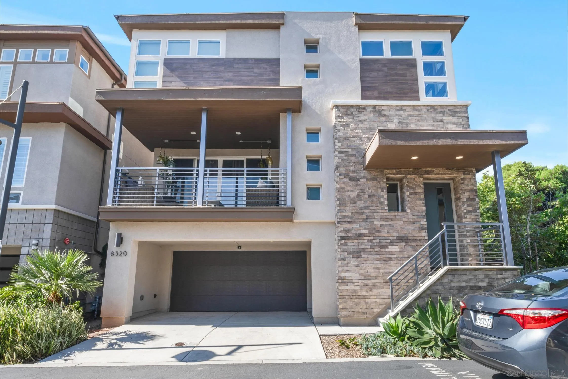 8329 Ridge Court San Diego, CA 92108 - Photo 2 of 39 a front view of a house with plants