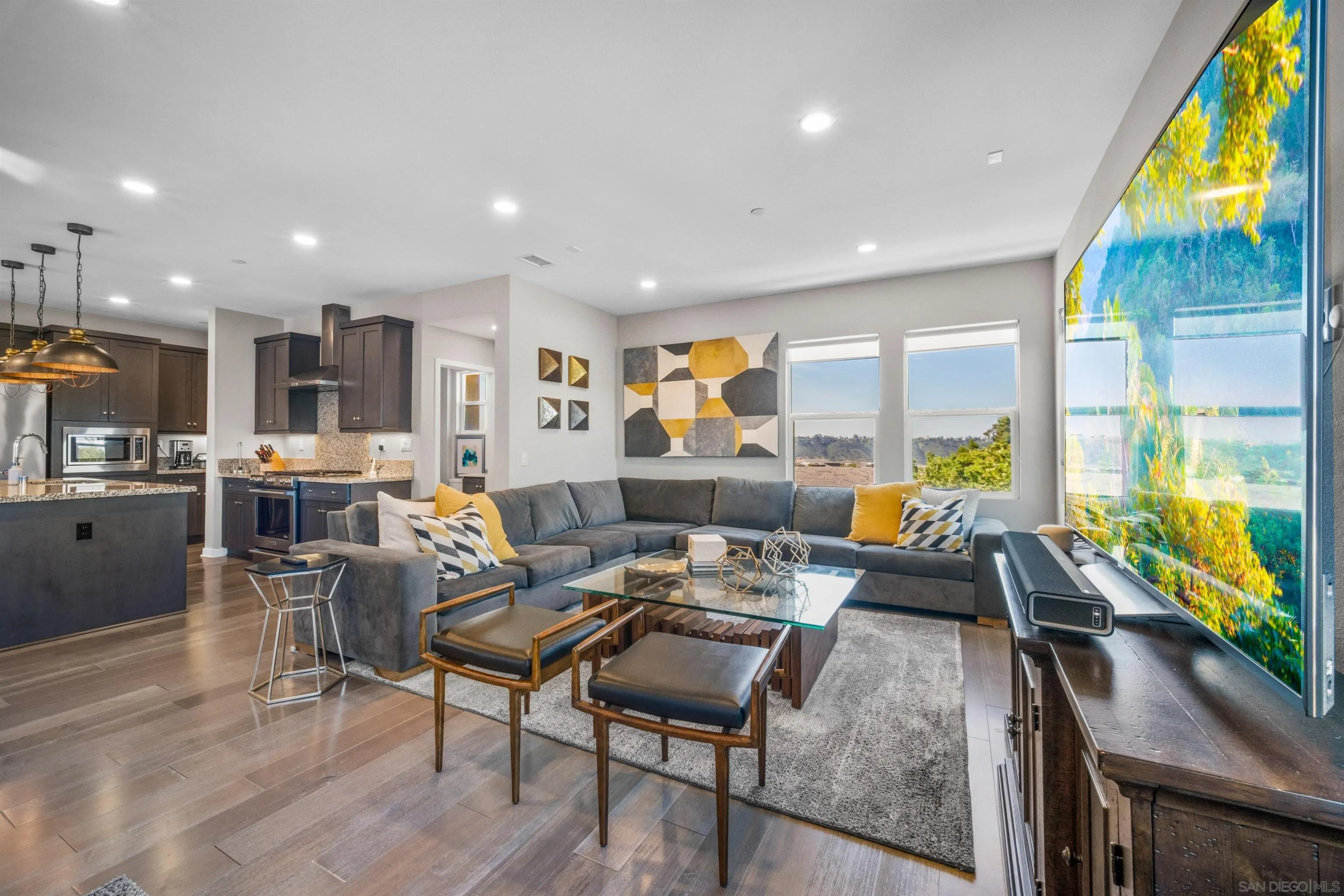 8329 Ridge Court San Diego, CA 92108 - Photo 21 of 39 a living room with lots of furniture and a floor to ceiling window