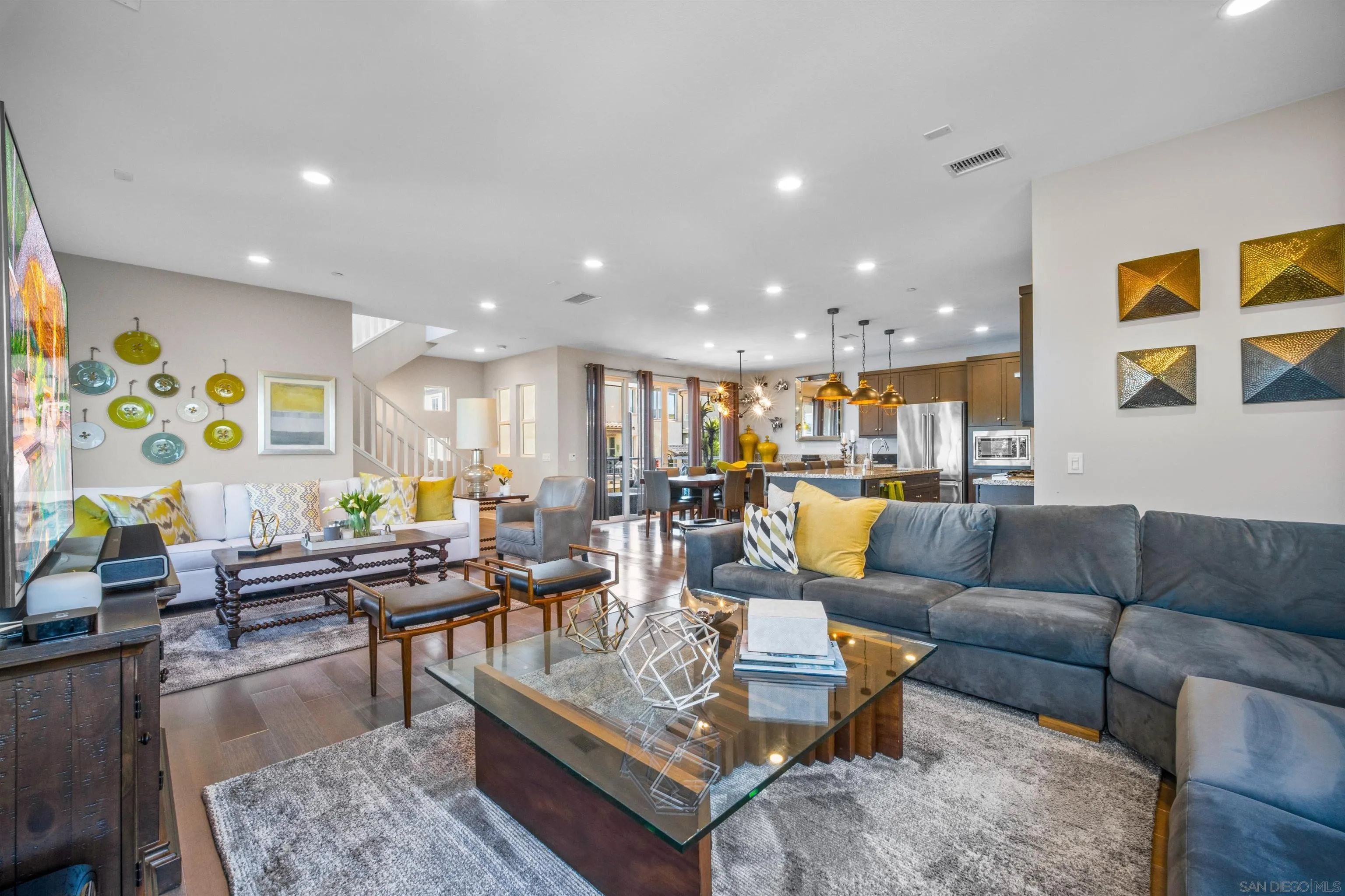 8329 Ridge Court San Diego, CA 92108 - Photo 23 of 39 a living room with furniture kitchen view and a table