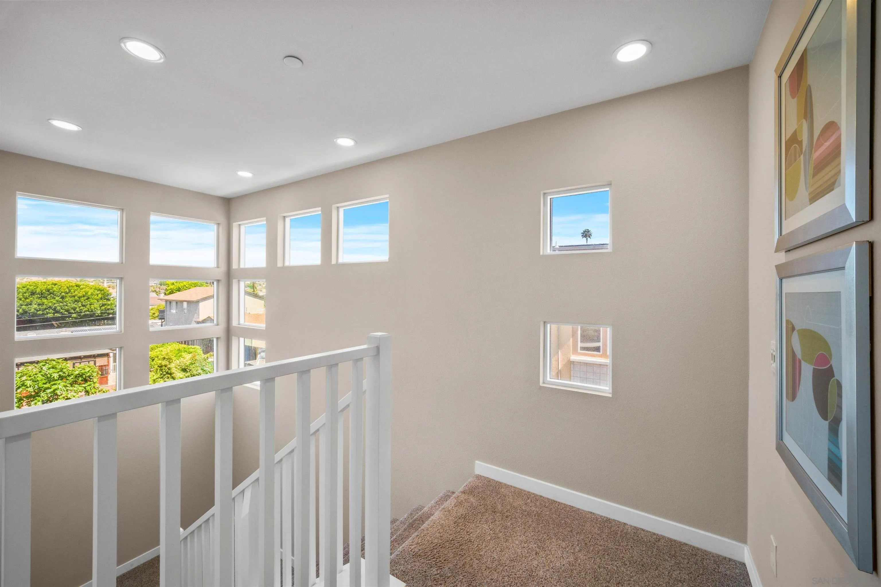 8329 Ridge Court San Diego, CA 92108 - Photo 26 of 39 a view of hallway with furniture and window