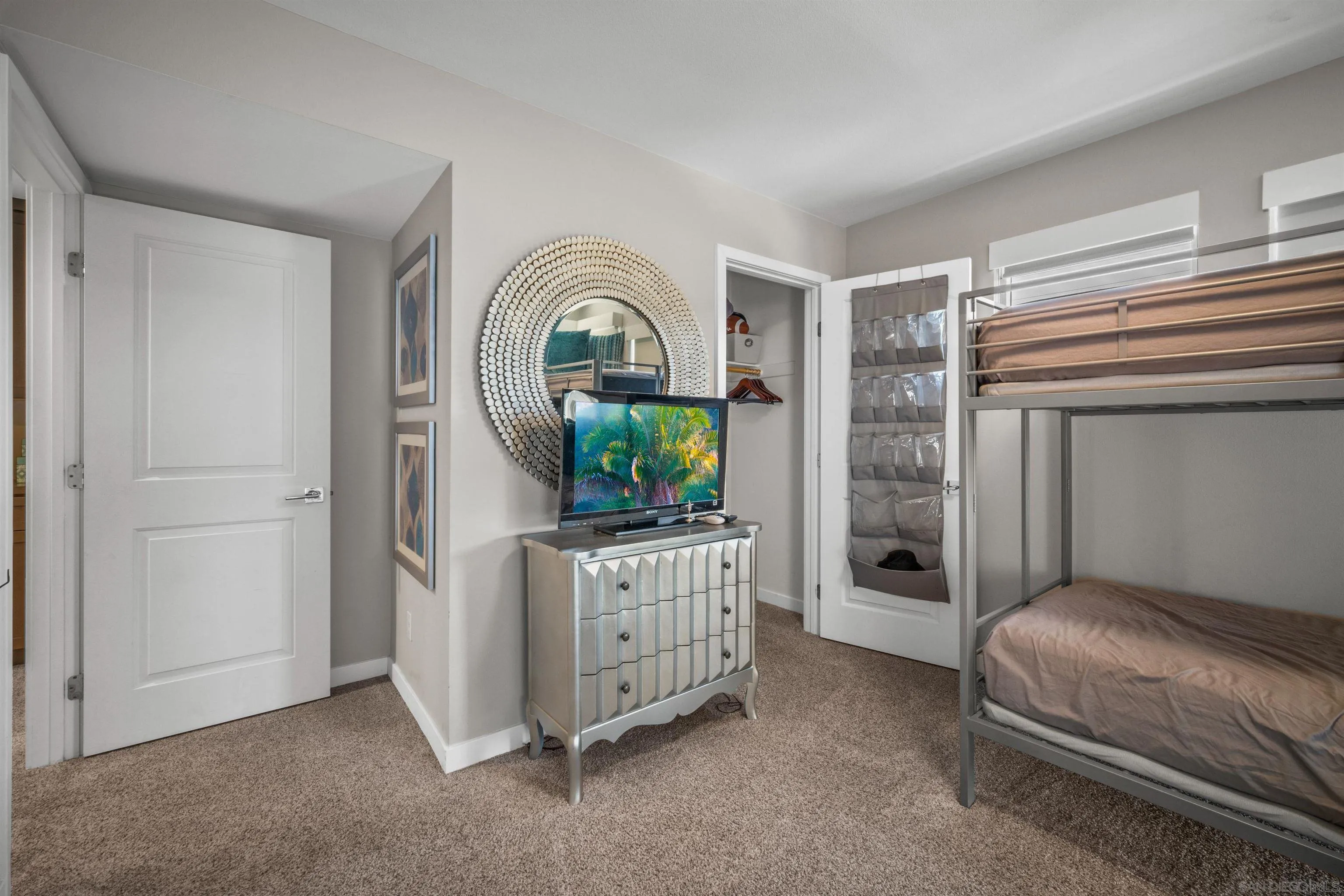 8329 Ridge Court San Diego, CA 92108 - Photo 31 of 39 a bedroom with a bed and a dresser