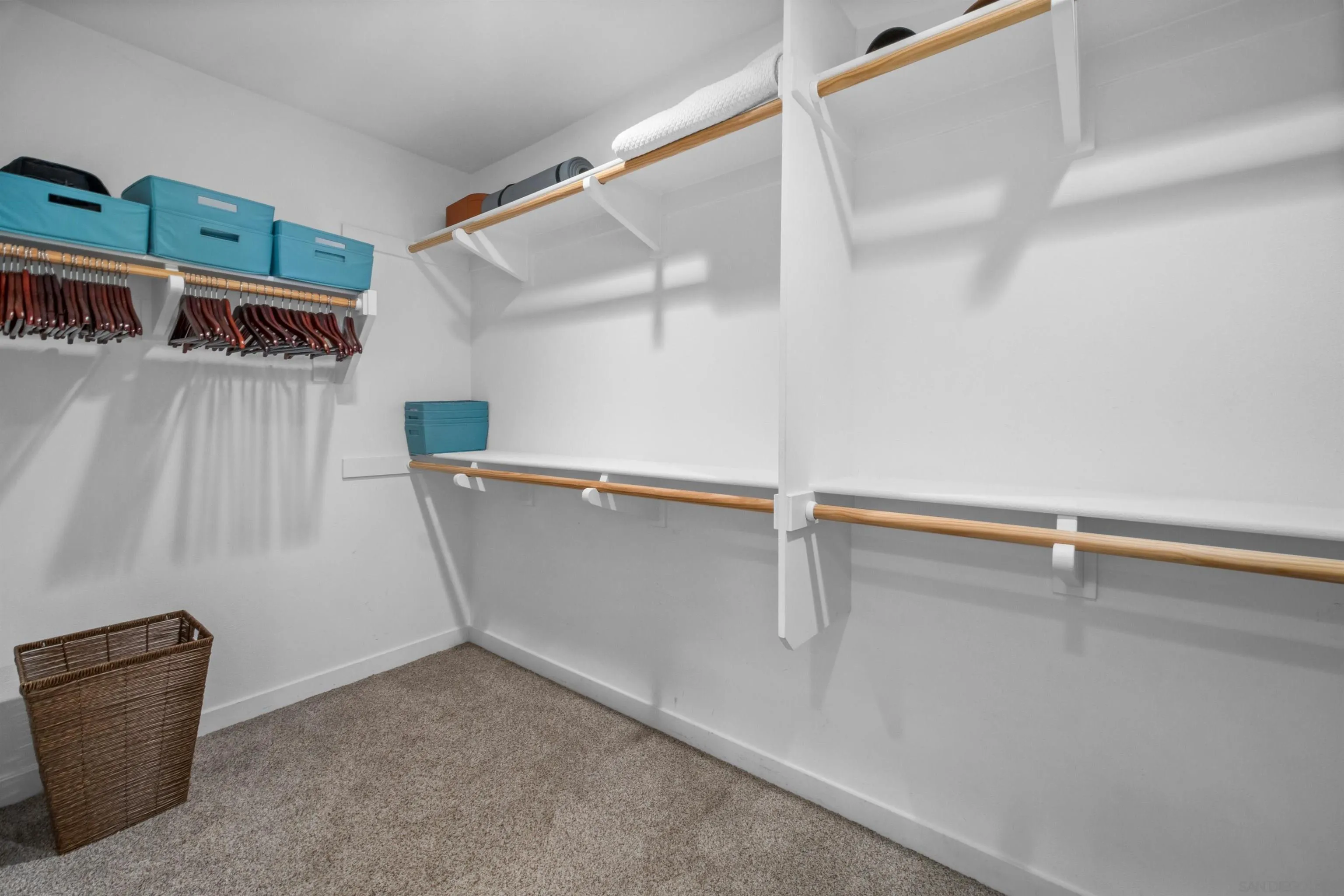 8329 Ridge Court San Diego, CA 92108 - Photo 35 of 39 a view of storage and utility room with racks on the wall