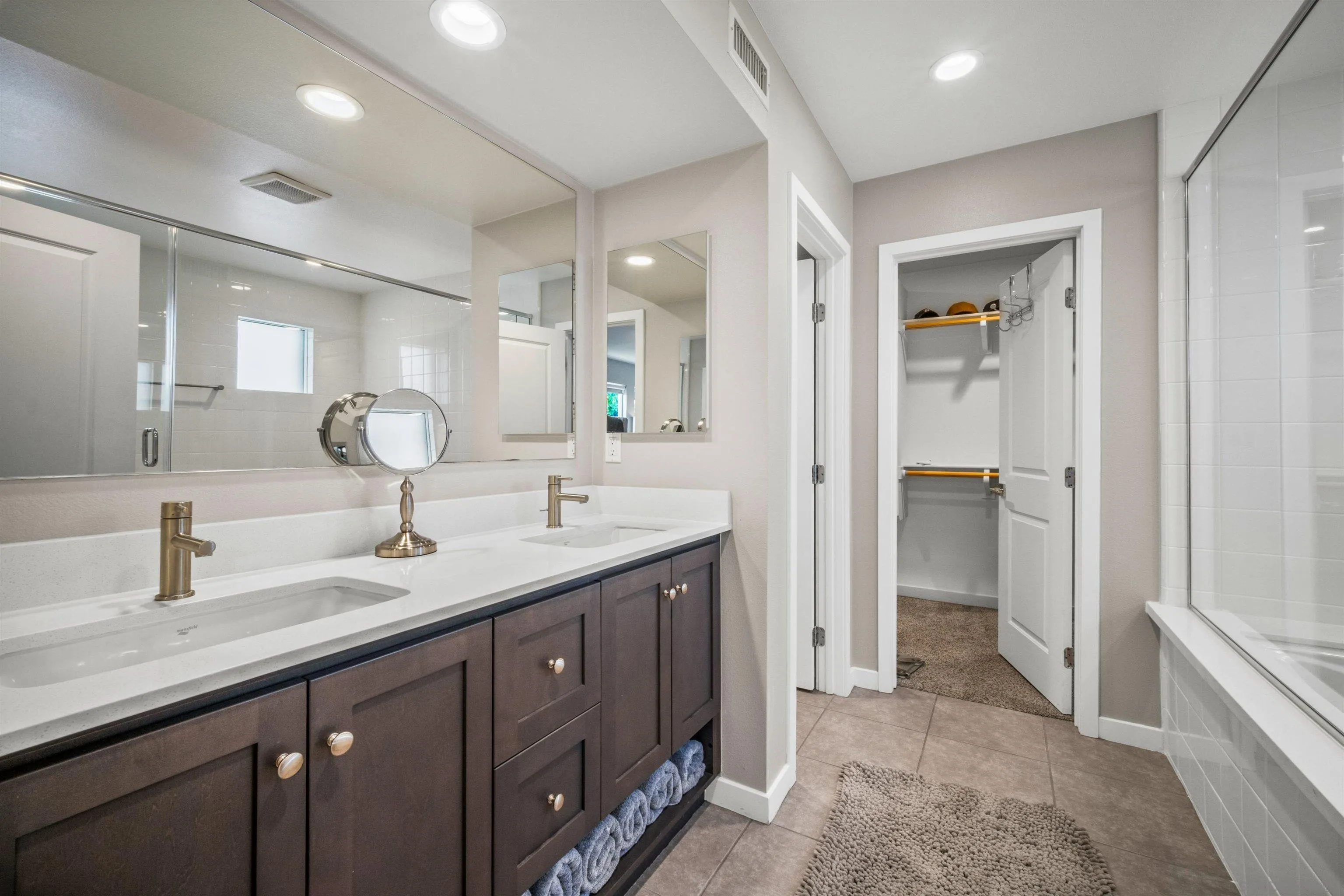 8329 Ridge Court San Diego, CA 92108 - Photo 38 of 39 a bathroom with a double vanity sink and mirror