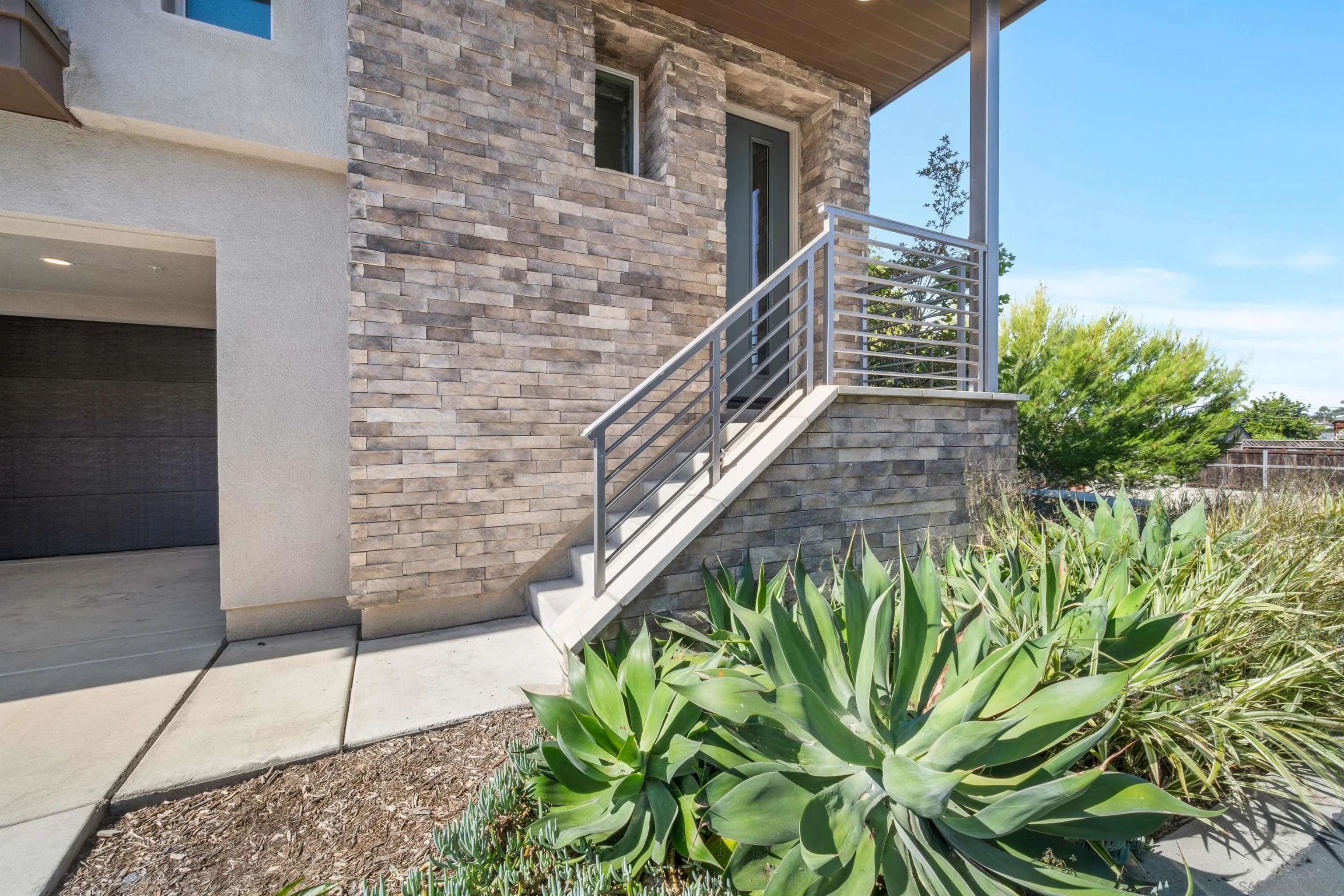 8329 Ridge Court San Diego, CA 92108 - Photo 4 of 39 a view of a pathway of a building