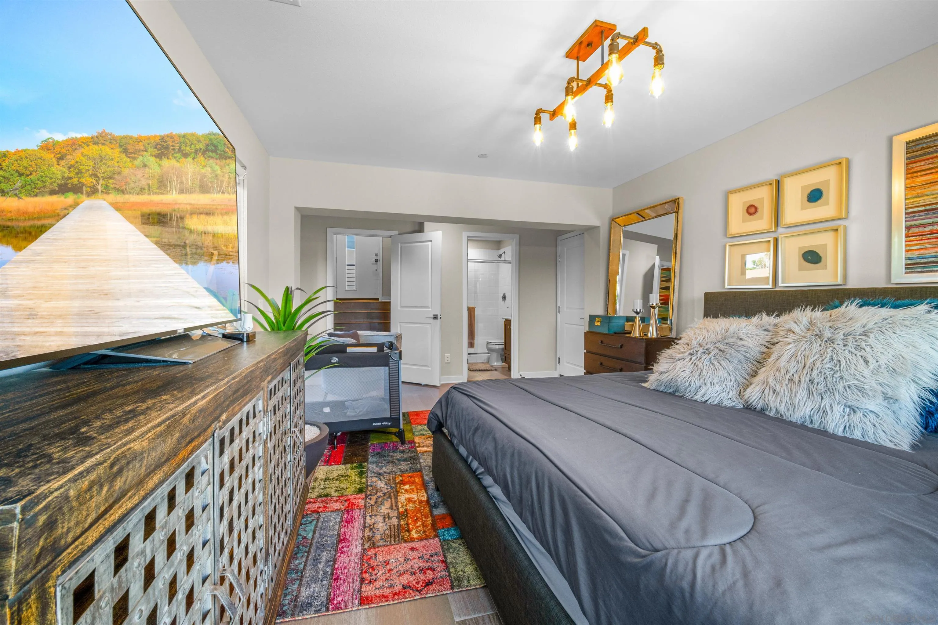 8329 Ridge Court San Diego, CA 92108 - Photo 9 of 39 a bedroom with a bed and a painting on the wall