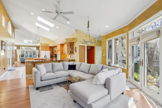 a bedroom with a bed and a mirror