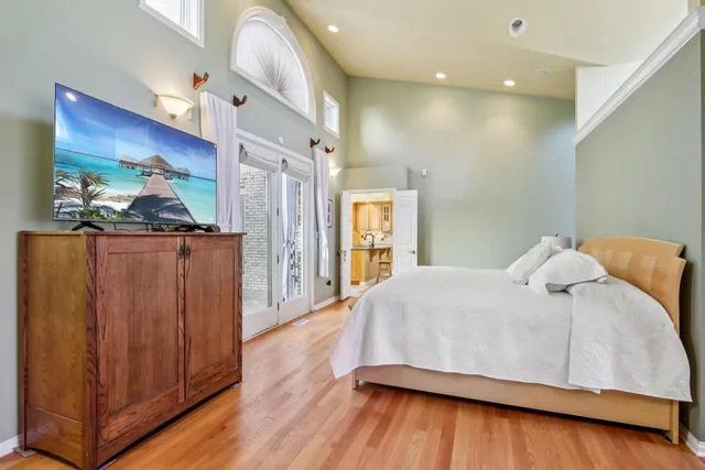 a bathroom with a bathtub and shower