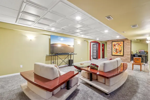 an aerial view of residential houses with outdoor space