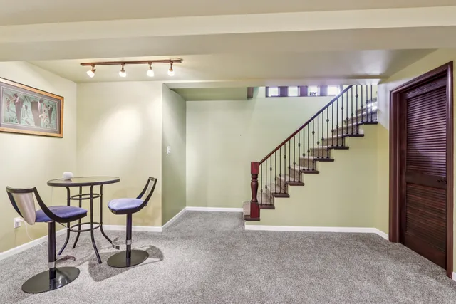 an aerial view of residential building and parking space