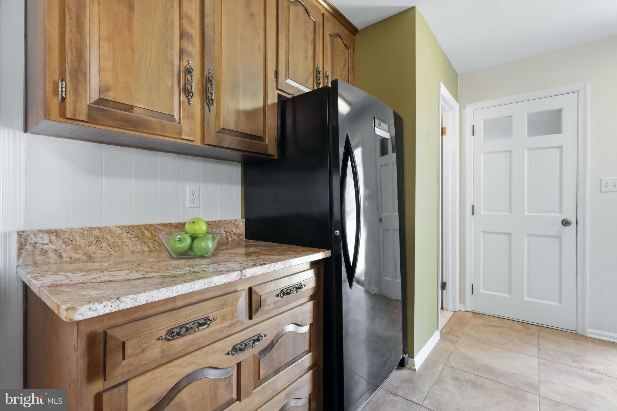 23500 River Road Lexington Park, MD 20653 - Photo 23 of 92 a kitchen with stainless steel appliances granite countertop a refrigerator and a stove
