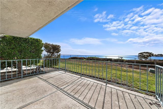 a view of swimming pool from balcony