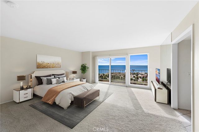 a bedroom with a bed and a walk in closet