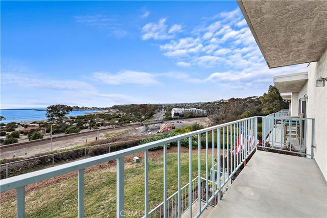 a view of a balcony with city view