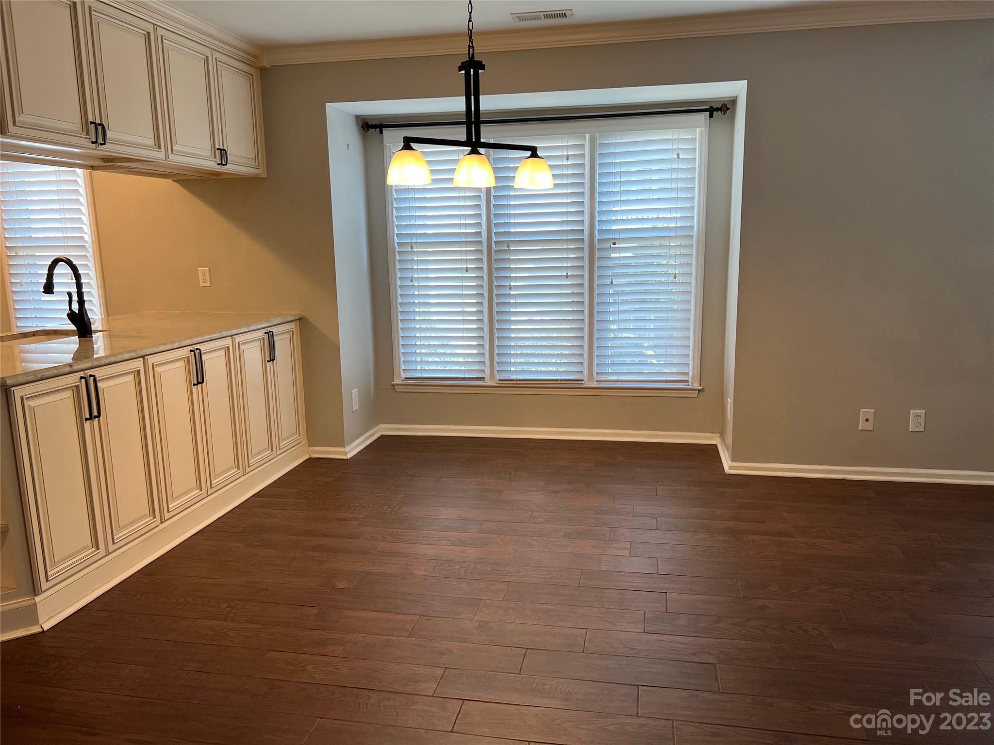 226 Queens Road Charlotte, NC 28204 - Photo 14 of 24 a view of an empty room with a window