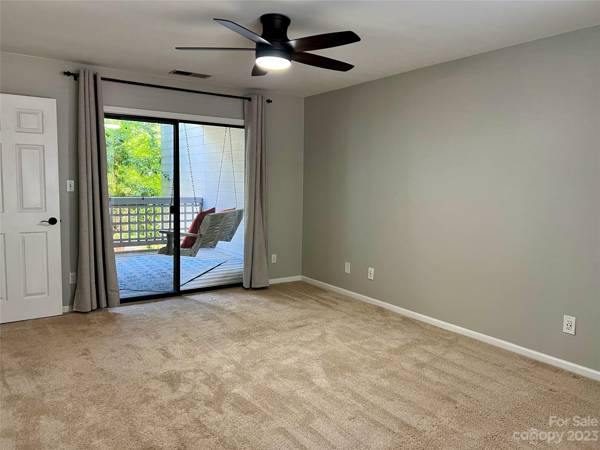 226 Queens Road Charlotte, NC 28204 - Photo 23 of 24 a view of an empty room with a balcony