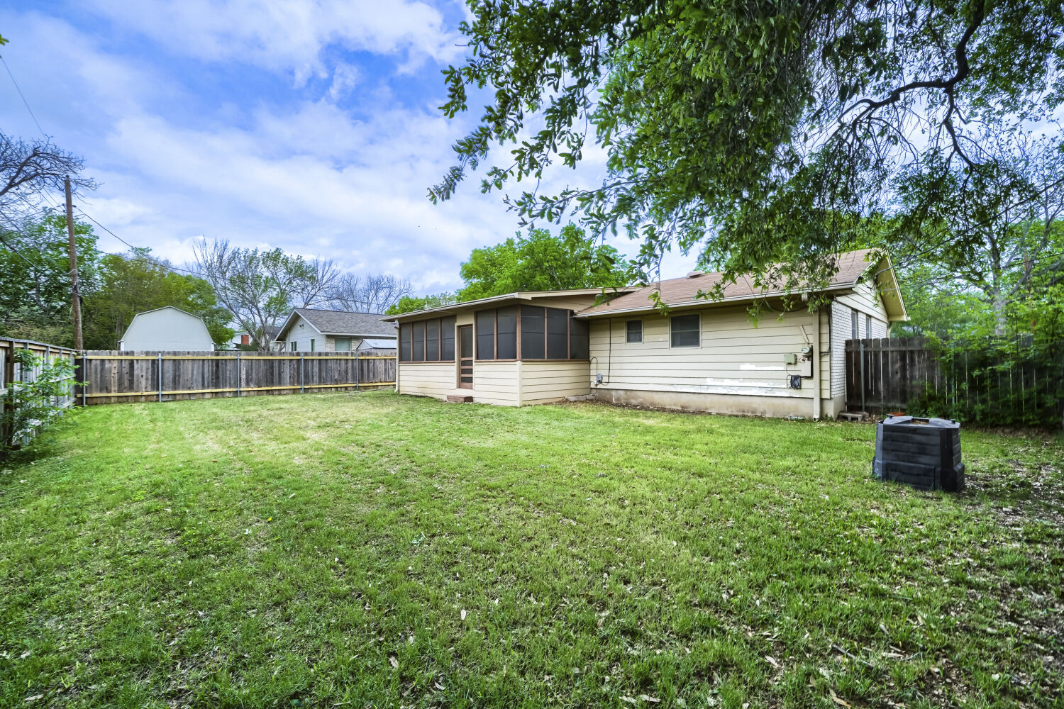 1909 Burbank Street Austin, TX 78757 - Photo 17 of 17 a view of a house with backyard