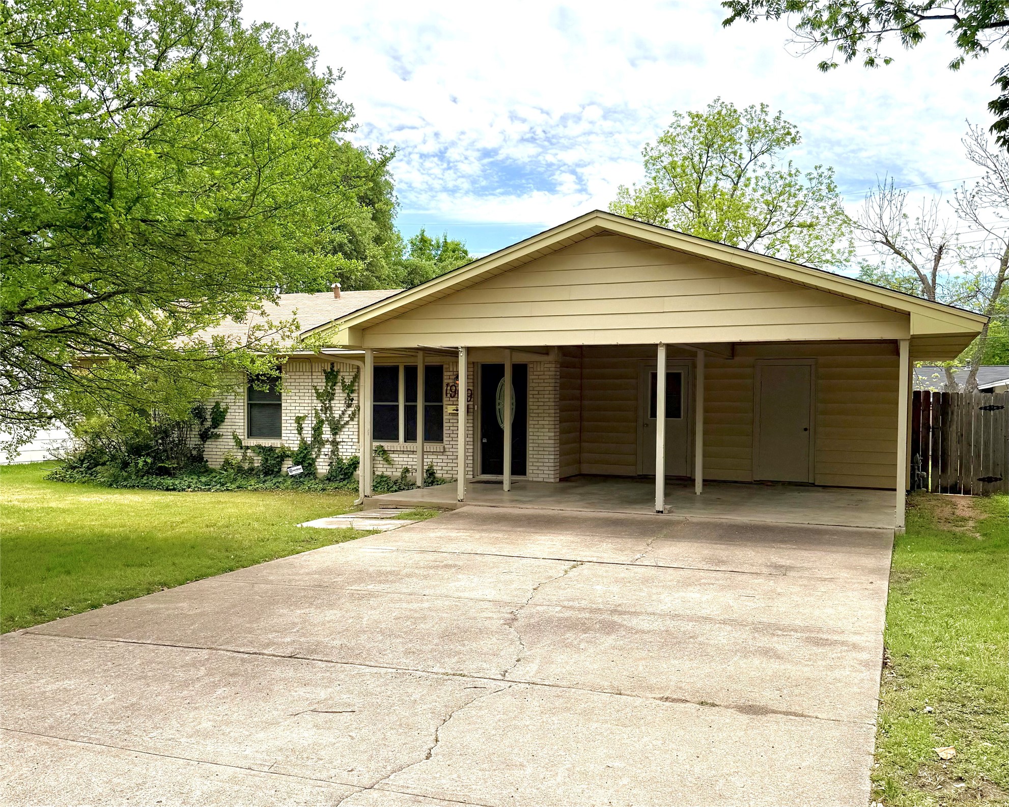 1909 Burbank Street Austin, TX 78757 - Photo 2 of 17 a house with outdoor space