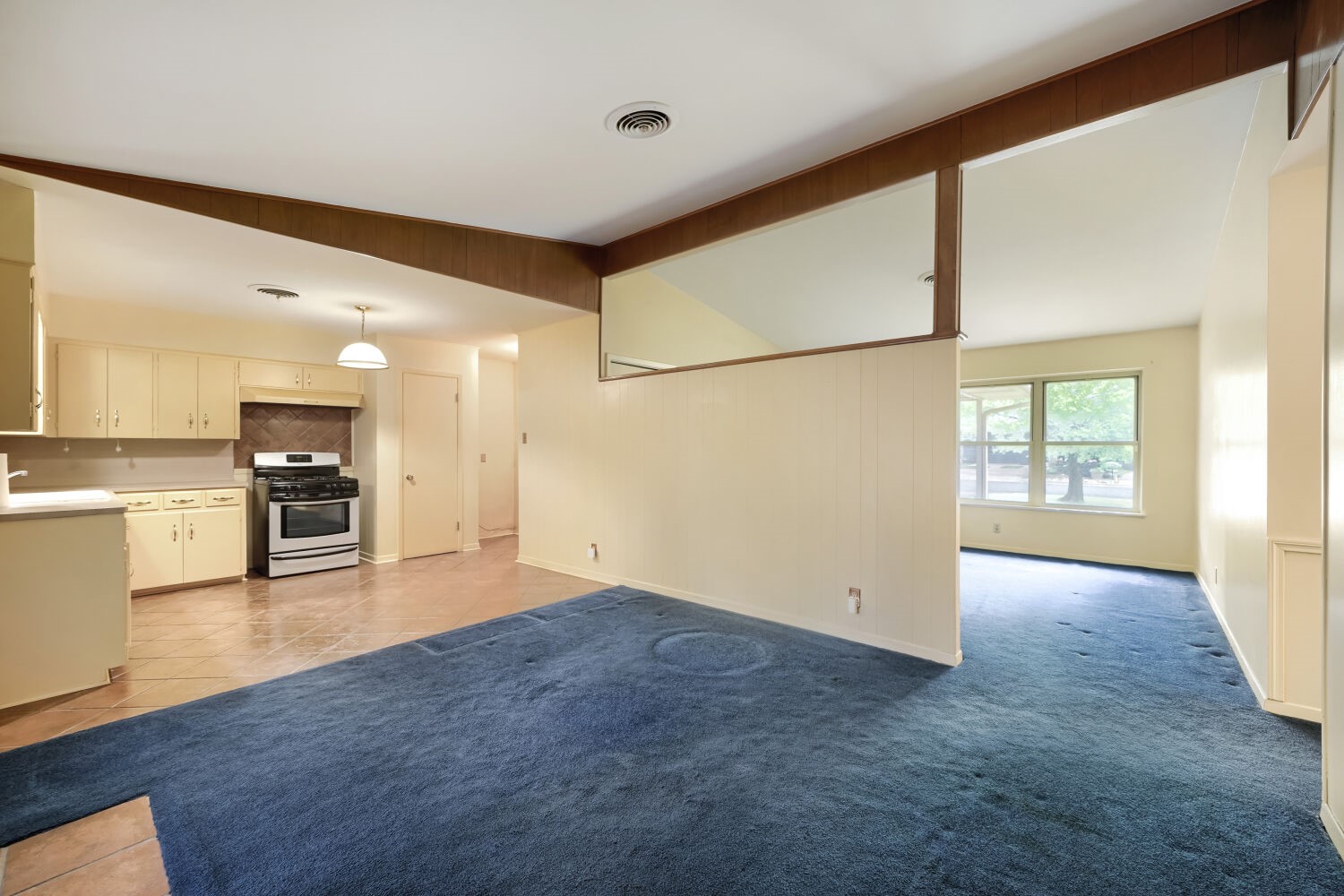 1909 Burbank Street Austin, TX 78757 - Photo 5 of 17 a view of a kitchen with a sink and a window