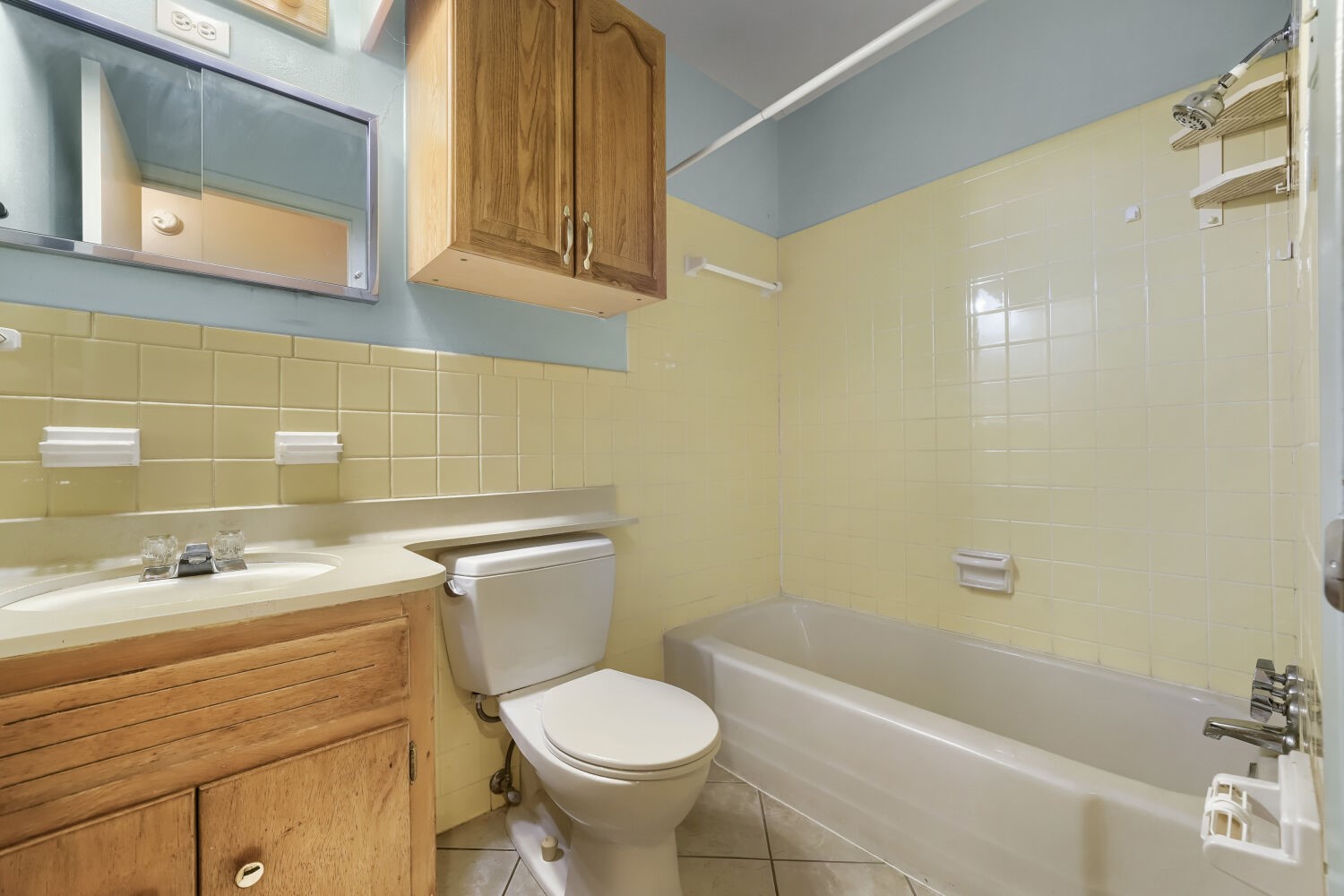 1909 Burbank Street Austin, TX 78757 - Photo 10 of 17 a bathroom with a sink toilet and shower