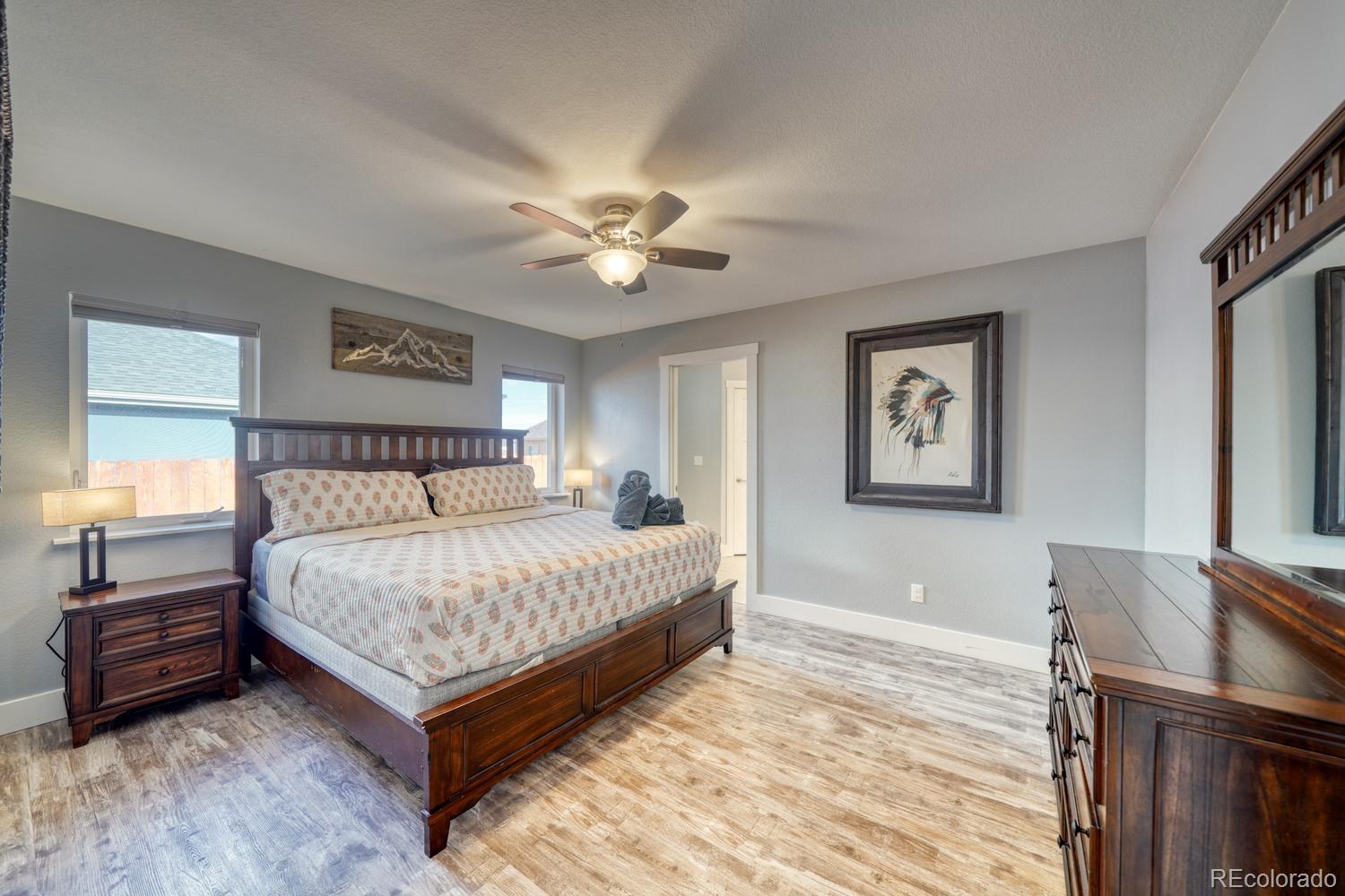 148 Grouse Road Buena Vista, CO 81211 - Photo 17 of 37 a bedroom with a bed a desk and chair