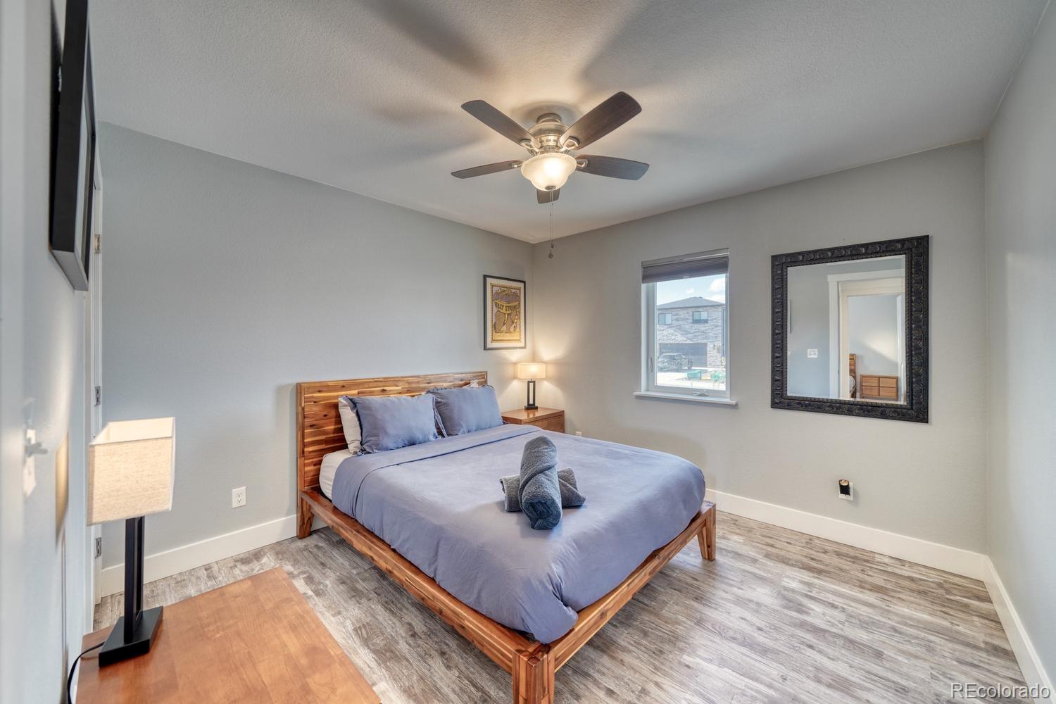 148 Grouse Road Buena Vista, CO 81211 - Photo 21 of 37 a living room with a bed furniture and a window