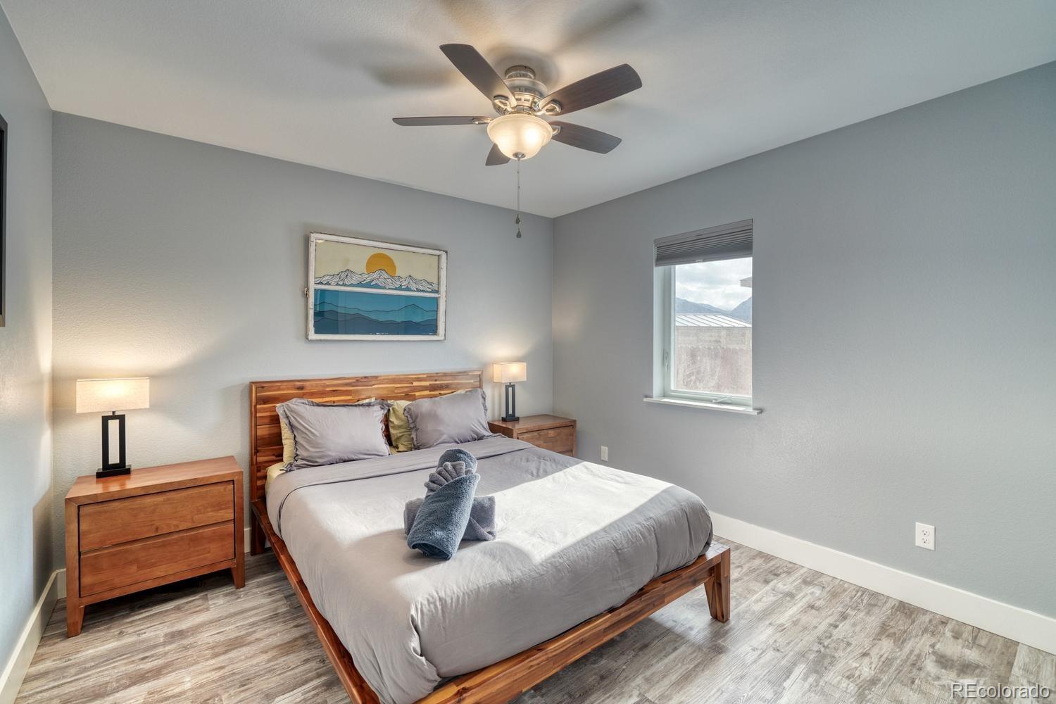 148 Grouse Road Buena Vista, CO 81211 - Photo 22 of 37 a bedroom with a bed and a couch