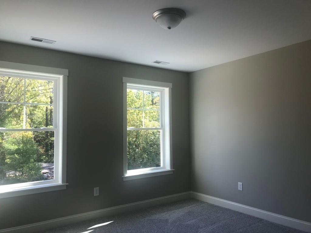 56 Clement Road Townsend, MA 01474 - Photo 15 of 23 an empty room with windows