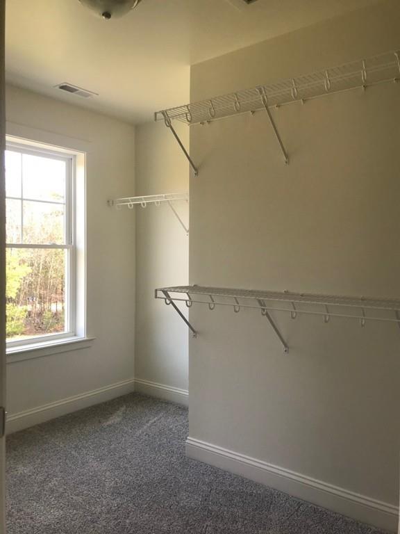 56 Clement Road Townsend, MA 01474 - Photo 17 of 23 a view of a room with racks on the wall