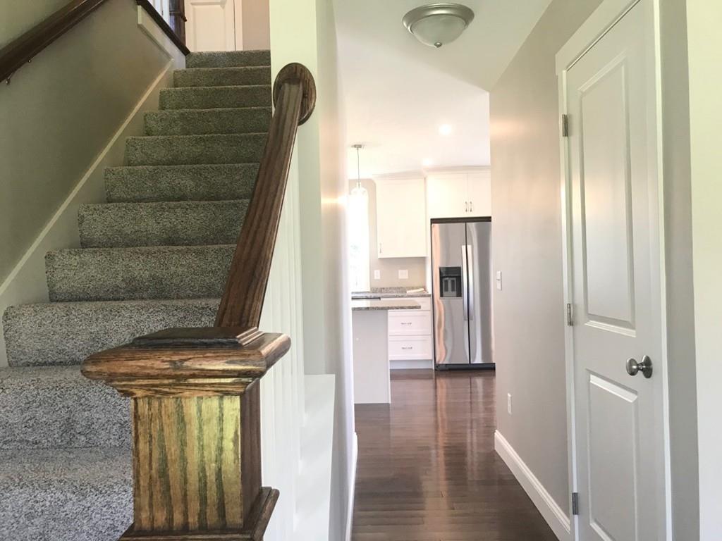 56 Clement Road Townsend, MA 01474 - Photo 20 of 23 a view of entryway and hall with wooden floor