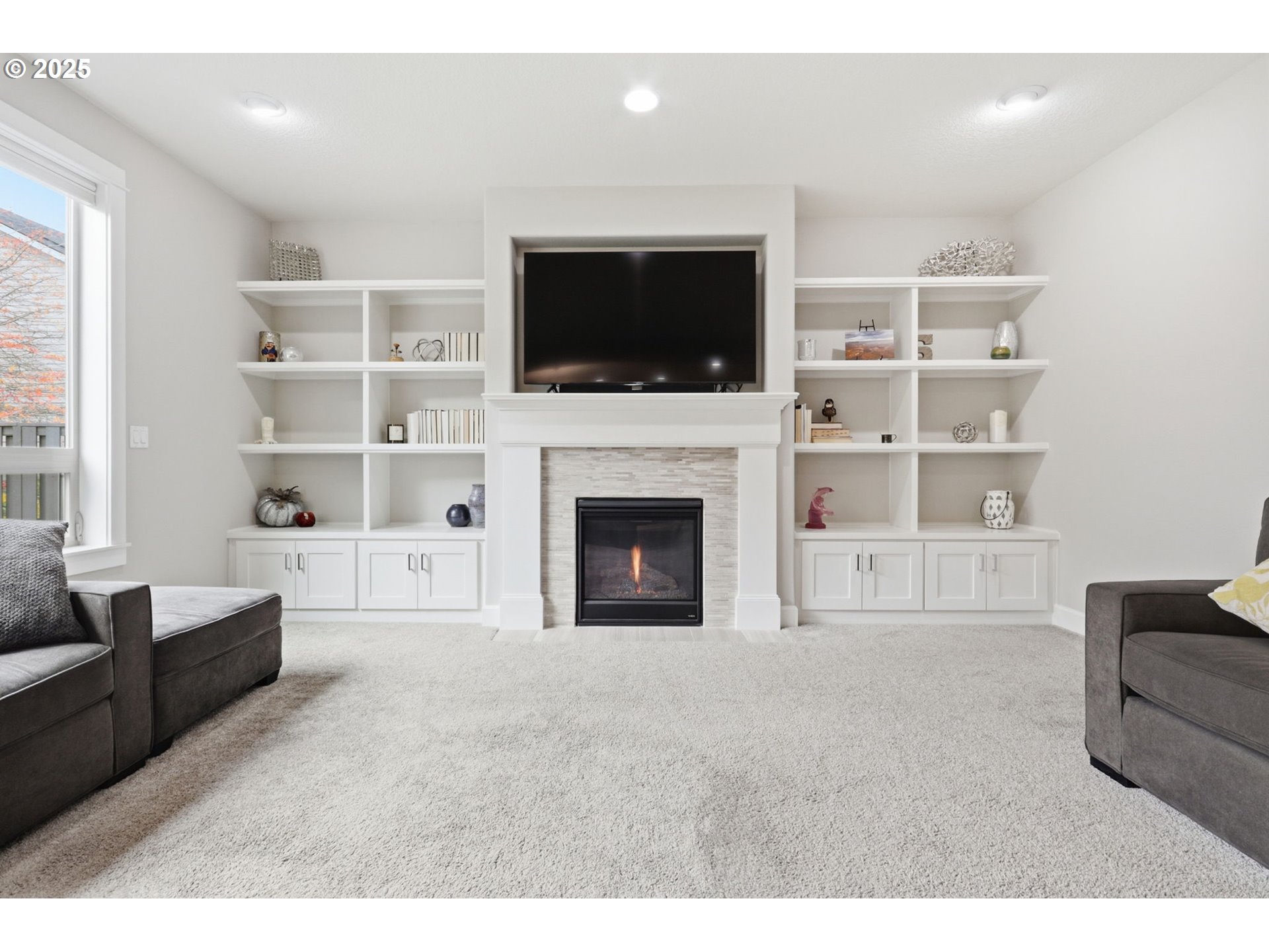 28337 Southwest Morningside Avenue Wilsonville, OR 97070 - Photo 13 of 48 a living room with furniture and a flat screen tv