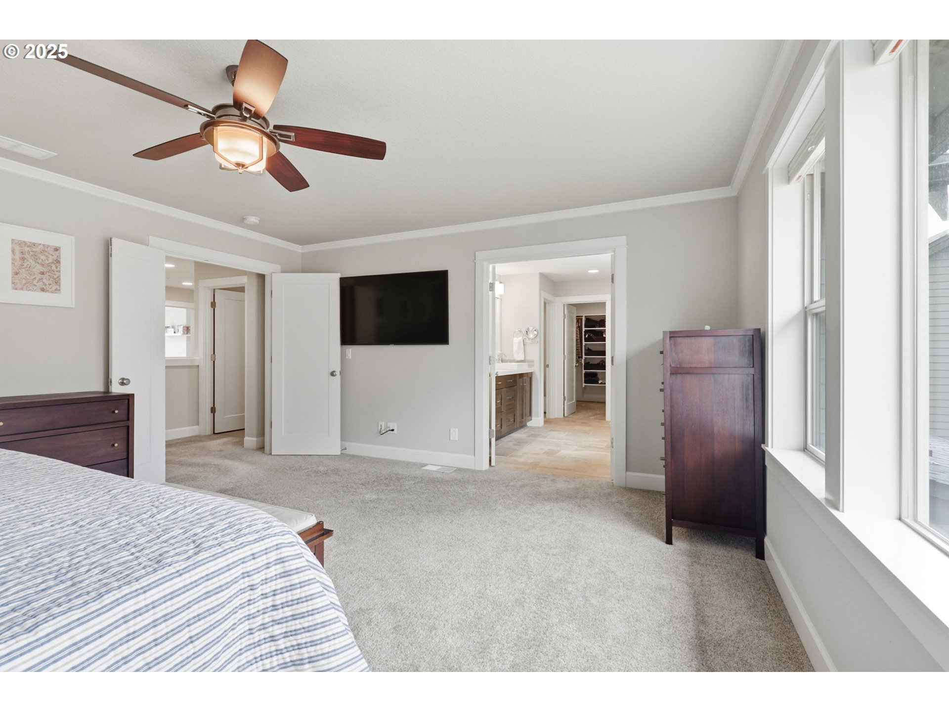 28337 Southwest Morningside Avenue Wilsonville, OR 97070 - Photo 19 of 48 a view of a livingroom with a ceiling fan and wooden floor