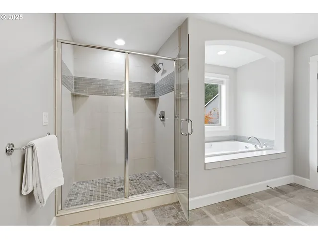 a utility room with sink dryer and washer