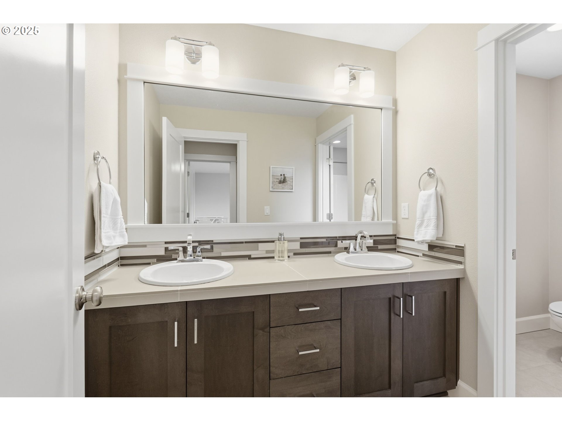 28337 Southwest Morningside Avenue Wilsonville, OR 97070 - Photo 30 of 48 a bathroom with a sink vanity and a mirror