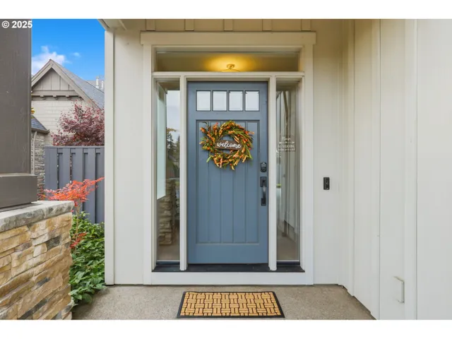 a bathroom with a sink mirror and vanity