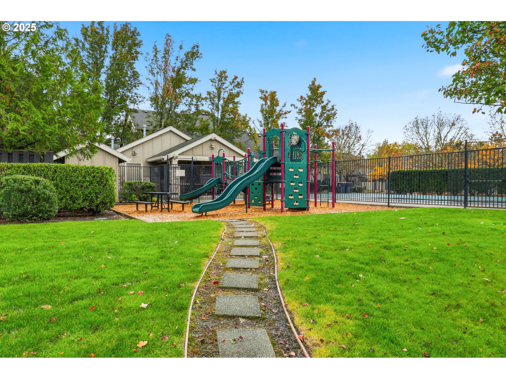 28337 Southwest Morningside Avenue Wilsonville, OR 97070 - Photo 38 of 48 a front view of a house with a yard table and chairs