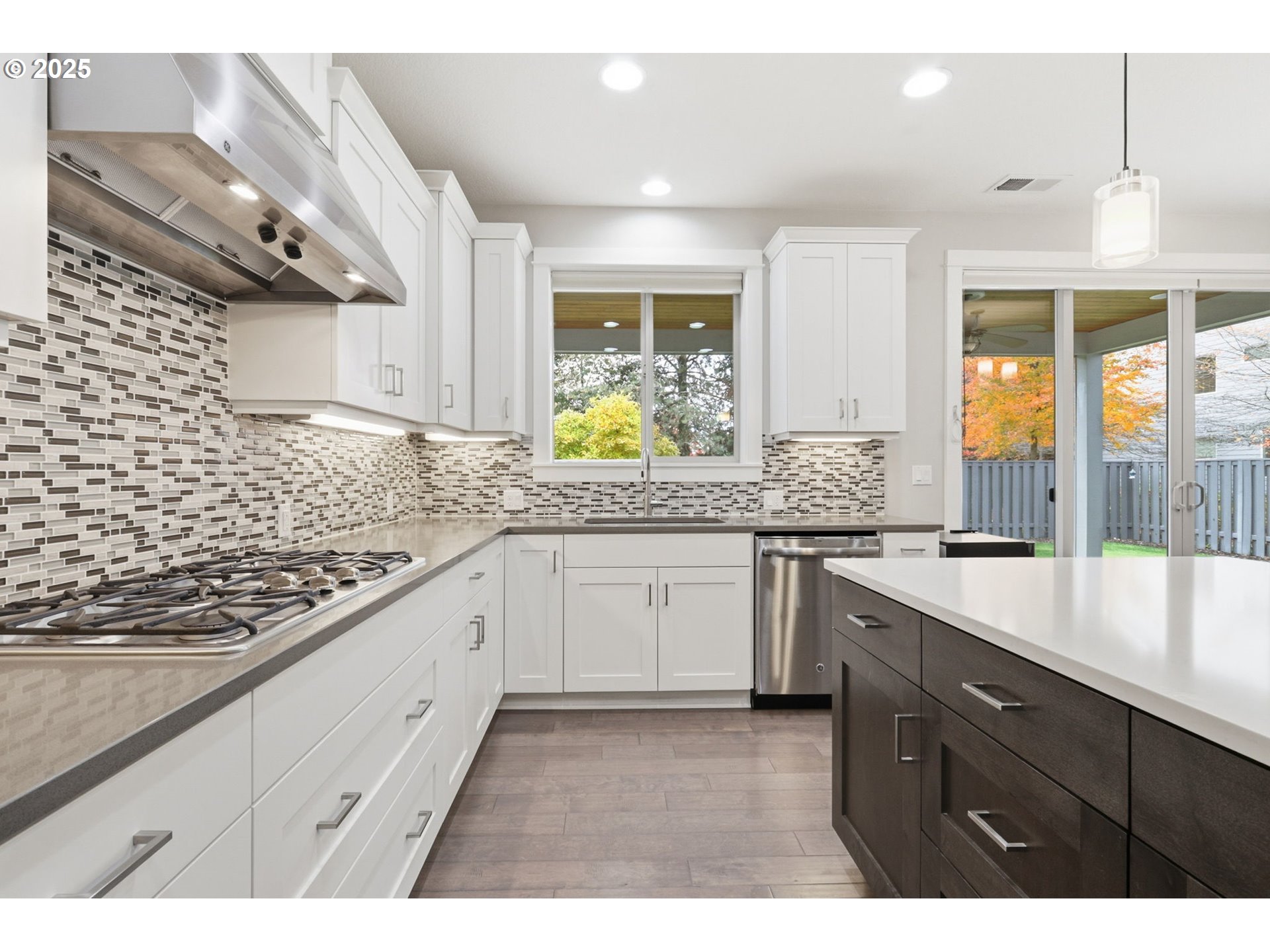28337 Southwest Morningside Avenue Wilsonville, OR 97070 - Photo 6 of 48 a kitchen with granite countertop a sink stainless steel appliances and cabinets