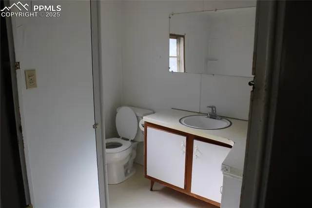 a bathroom with a sink and a toilet